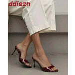 Foot Model In Wine Red Heeled Footwear Slide