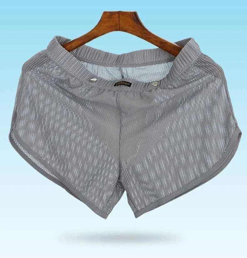 Men's Underwear Mesh Loose Arrow Pants Breathable Athletic Shorts Men's Pants Pantyhose Boxer Shorts.