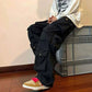 MULTI POCKET CARGO PANTS.